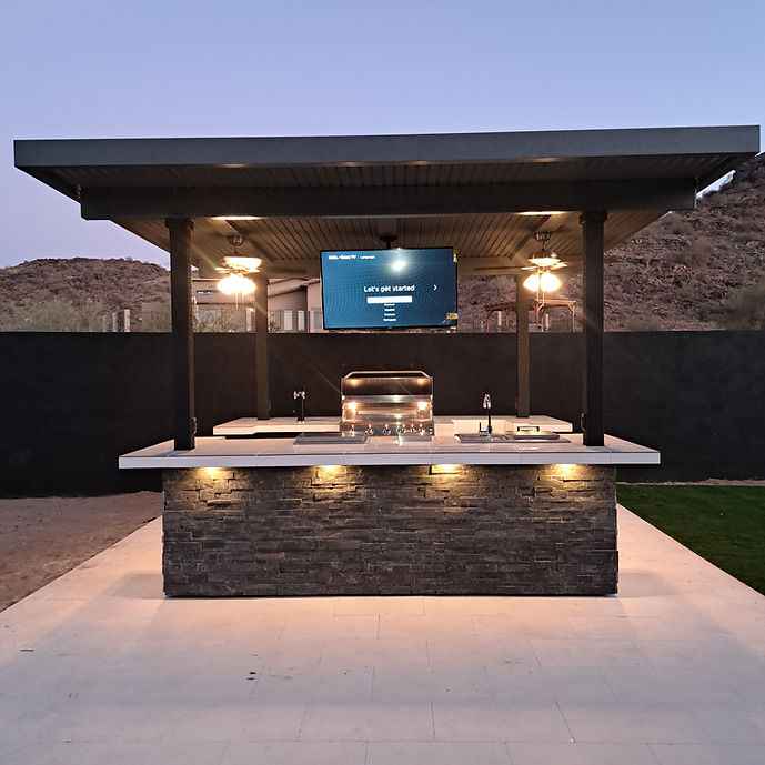 KoKoMo outdoor sports bar kitchen island with grill and TVs